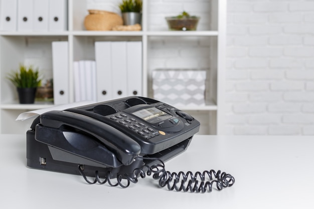 Old fax machine on the table