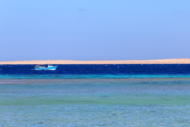 Old fishing boat sailing in the Red sea Egypt