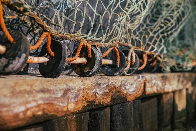 Old fishing net on a rotten wooden pier