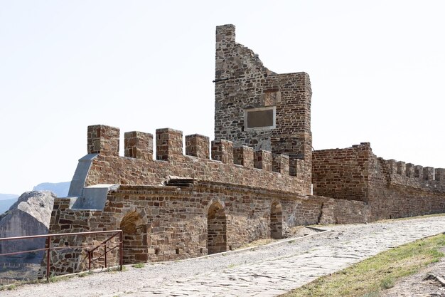 Old fortress made of ancient stone, castle ruins, outside view