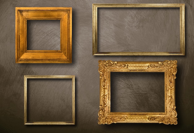 Old frames hanging on wall