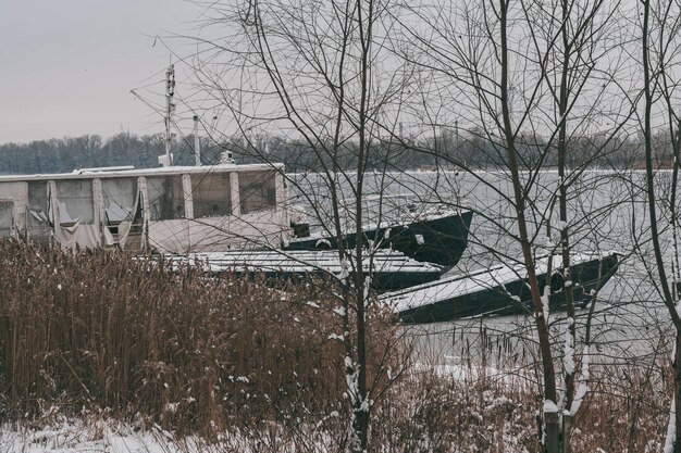 An old frozen ship on the banks of the Dnipro River Kyiv Ukraine
