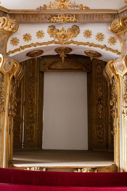 An old gothic gold frame wall decor in old architecture