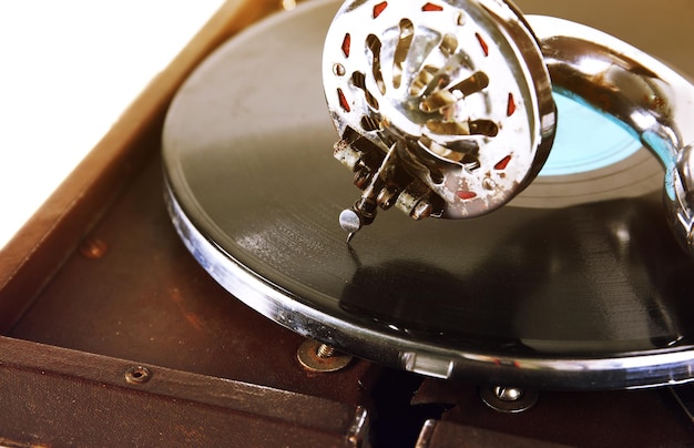 Old gramophone isolated on white