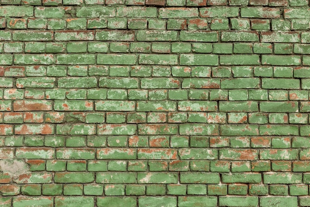 Old green brick wall, rustic texture