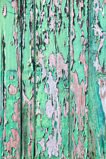 Old green painted wooden board background