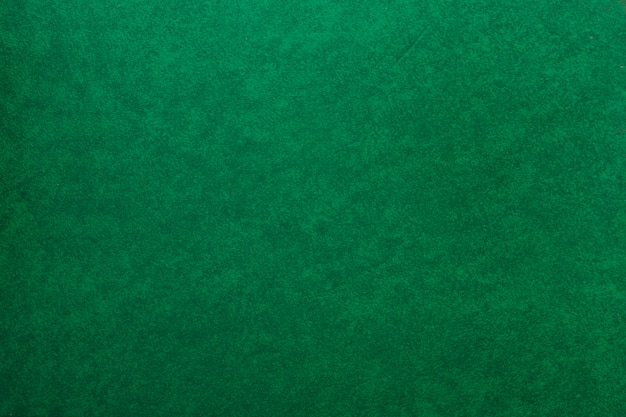 Una vecchia carta verde con texture di sfondo