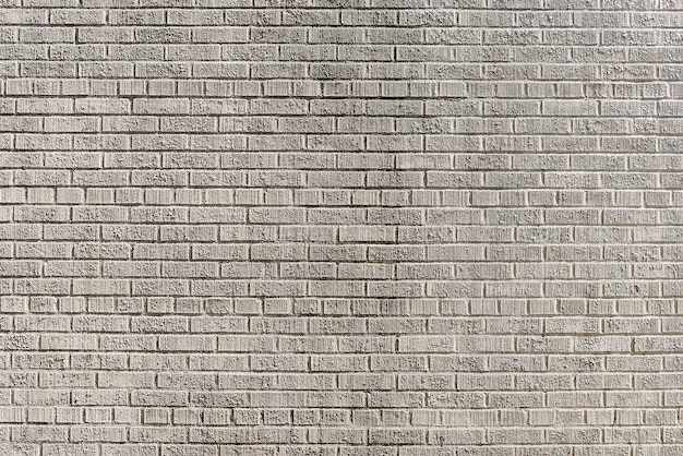 Old grey brick wall background