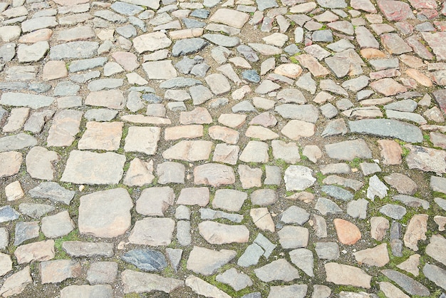 Old grey stone pavement background texture