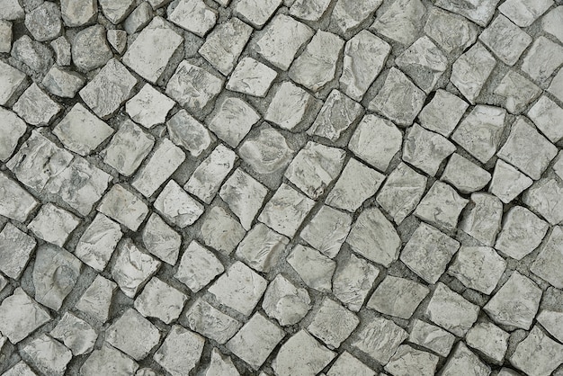 Old grey stone pavement background