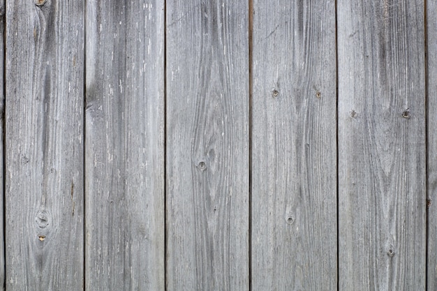 Old grey vertical boards as wooden background