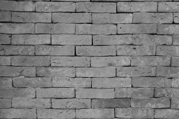 Old grunge brick wall background while and black