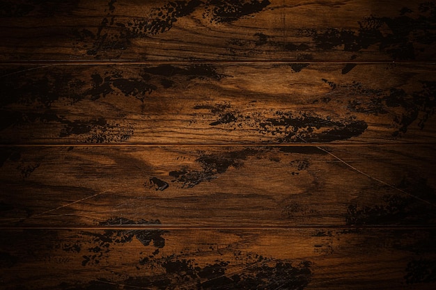 Old grunge dark textured wooden background with vignette