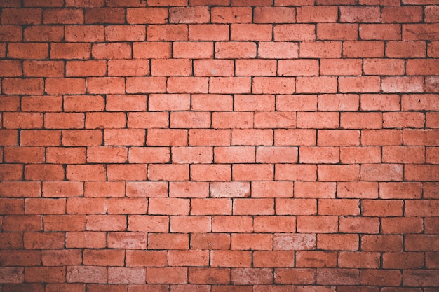 Photo old grunge orange brick wall