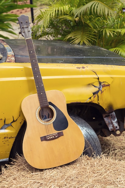 Old Guitar and old truck decoration at rice field