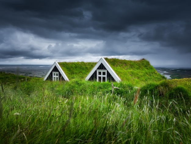 Old historic houses on the field in Iceland Natural icelandic background Travelling on Iceland Famouns place Travel image