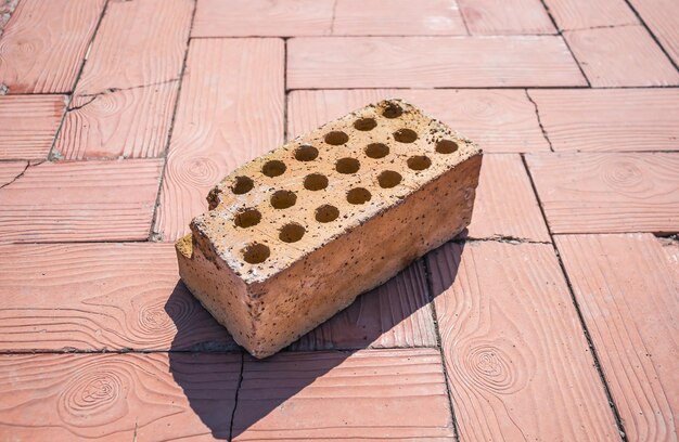 Old hollow brick on a construction site closeup