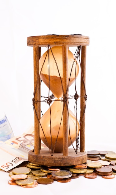 Old hourglass (made in India, XIX century) with euros