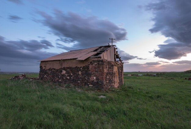 old house in the green field