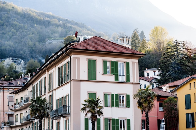 Old house surrounded by palm trees in menaggio lake como italy