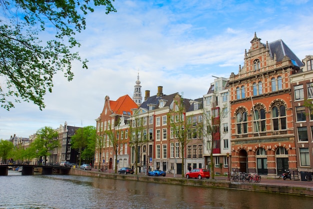 Old houses on canal in Amsterdam, Netherlands