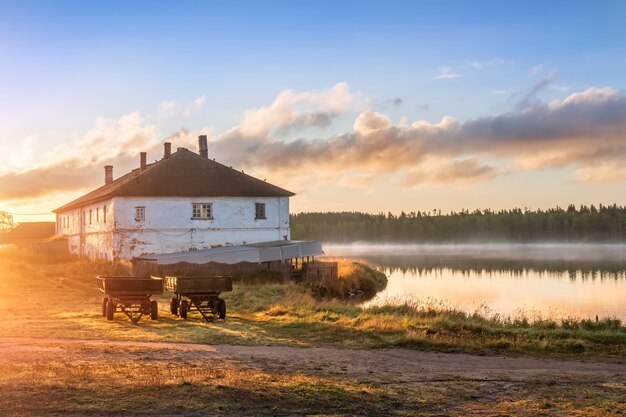 Old houses of the village on the Solovetsky Islands on the shore of the Holy Lake