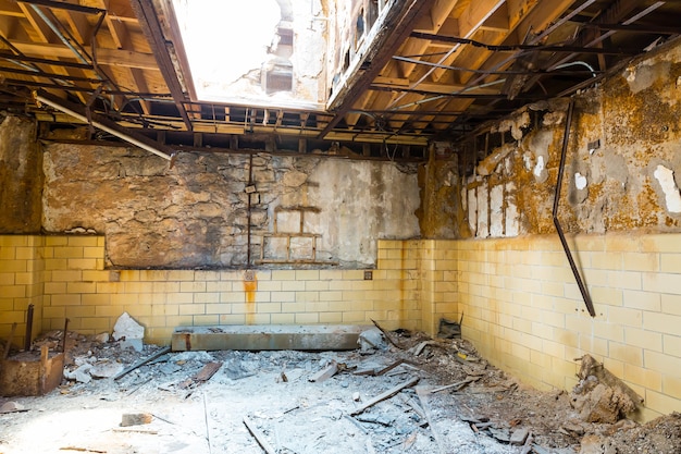 Old jail interior with brick walls.