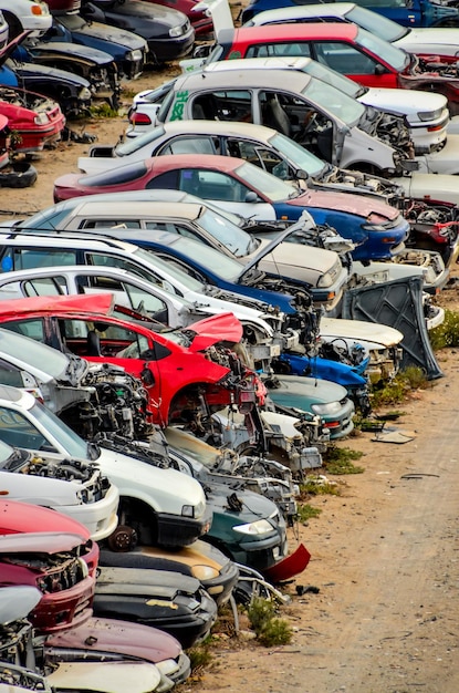 Photo old junk cars on junkyard