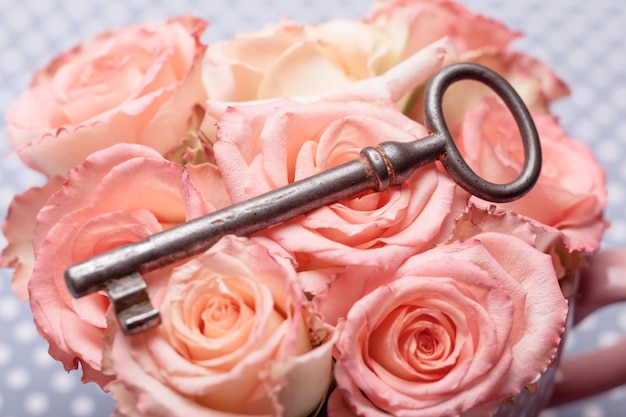 Old key and roses