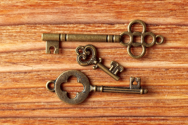 Old key on wooden table