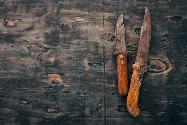Старый нож Кухонная утварь Свободное место для текста Вид сверху
