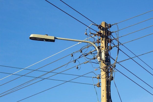 old lamp and electric pole