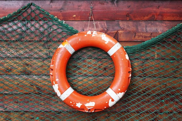 Old life belt and fishing net