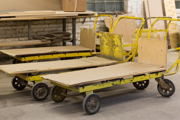 old loaders at furniture factory workshop