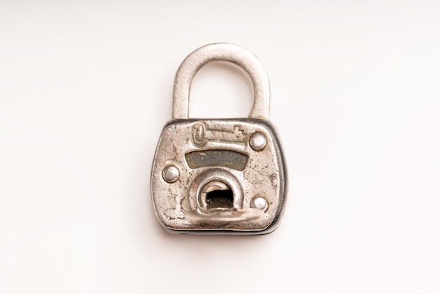 Old lock on a white background isolated