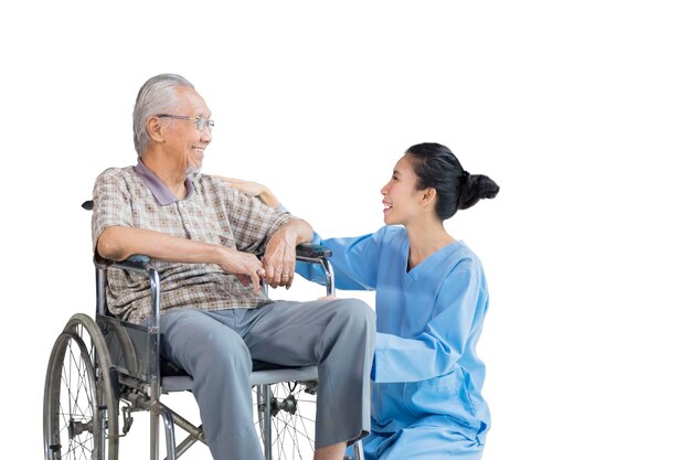 Old man chatting with his caregiver on studio