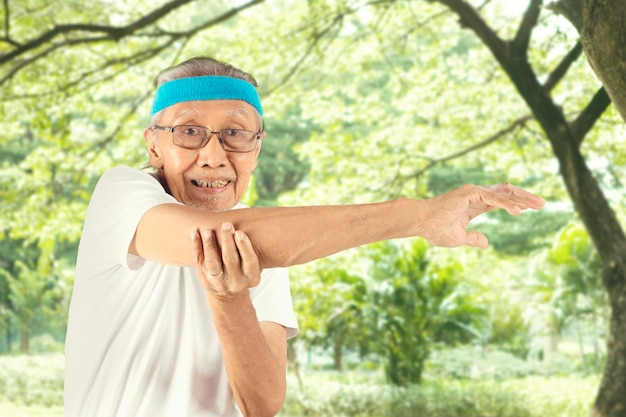 Old man exercising in the park