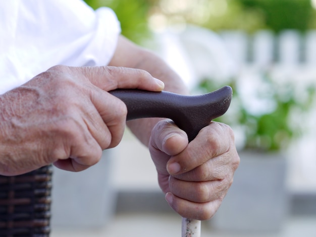 Old man holding a stick