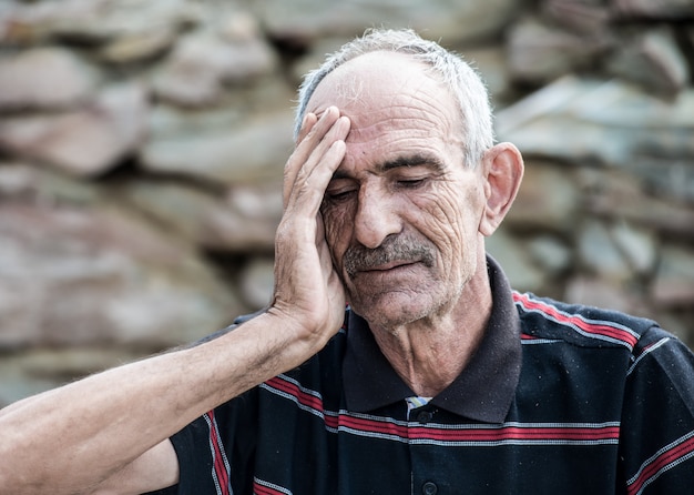 Old man sitting alone 