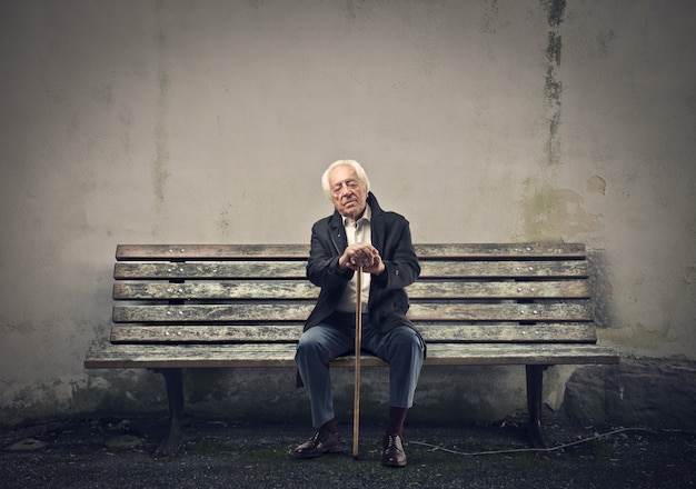 Old man sitting on a bench