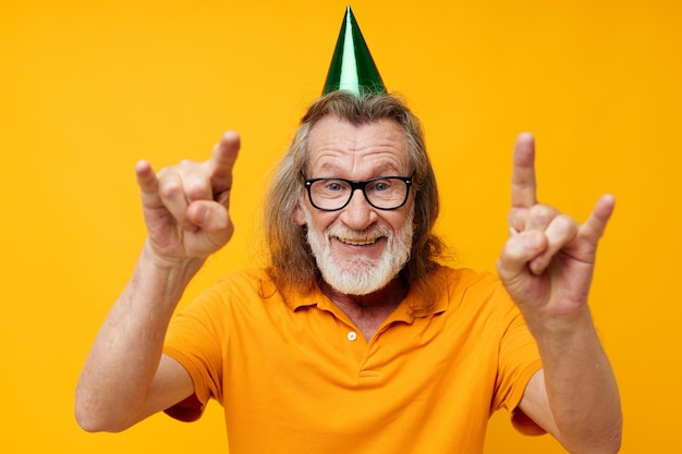 Old man wearing glasses green cap on his head holiday emotions\
monochrome shot