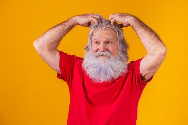 Old man with itchy and dandruff hair