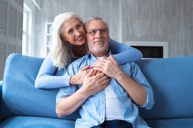 The old man and a woman hugging