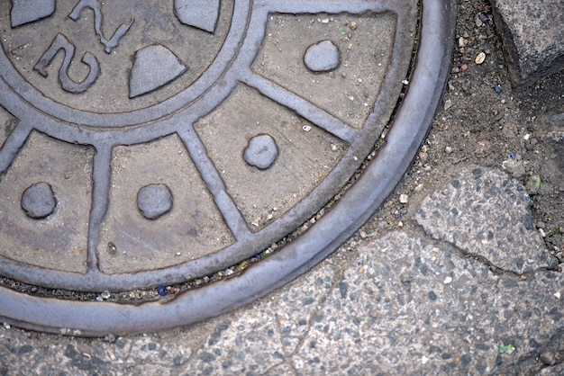 Old manhole cover