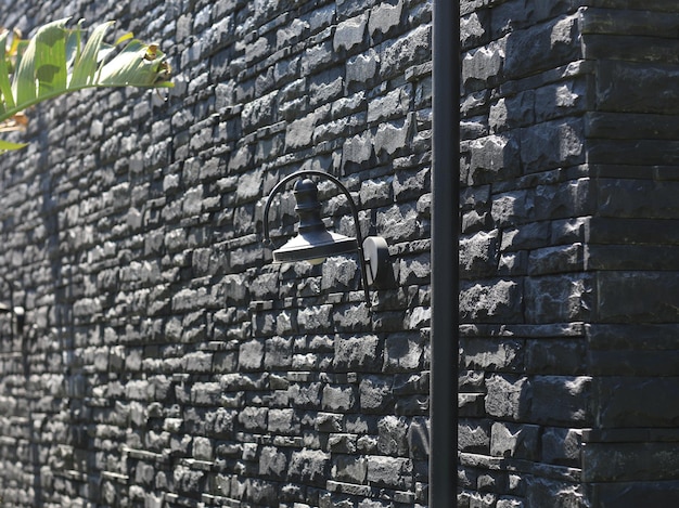 old masonry black stone wall