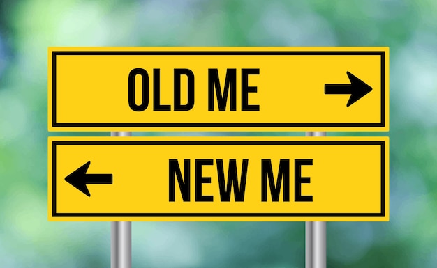 Old me or new me road sign on blur background