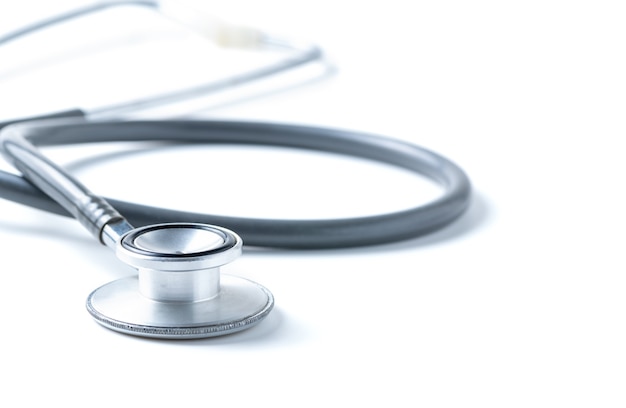 old medical stethoscope isolated. health care concept.