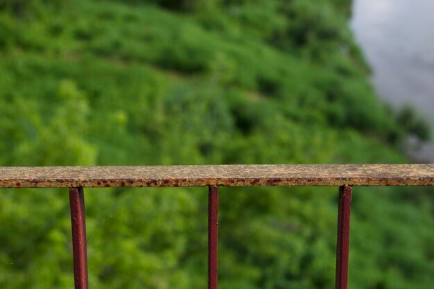 old metal bridge detail near the summer river bank