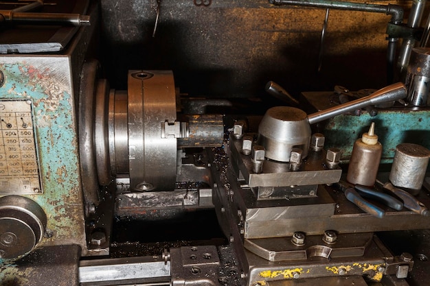 Old metal lathe in the workshop, metalworking, machine tools