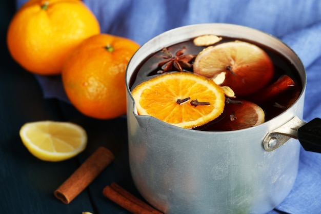 Old metal pan of tasty mulled wine